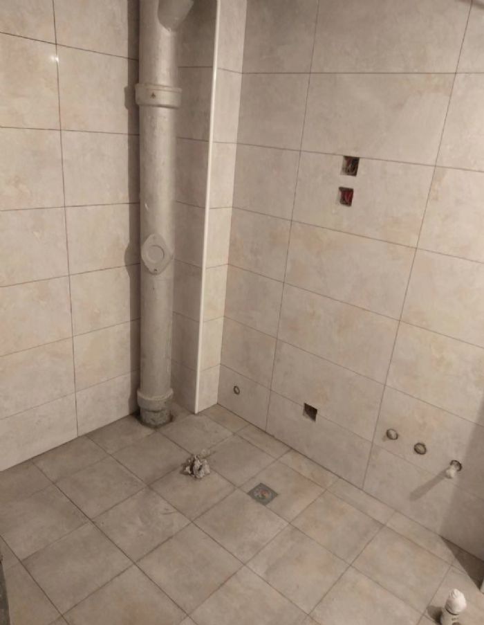 北京阜光里小区1号楼3单元301瓦工施工结束装修效果图